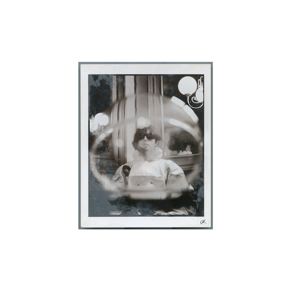 Black and white image print of a person wearing a space suit and sunglasses, viewed with a circular framing effect resembling the inside of a space helmet.